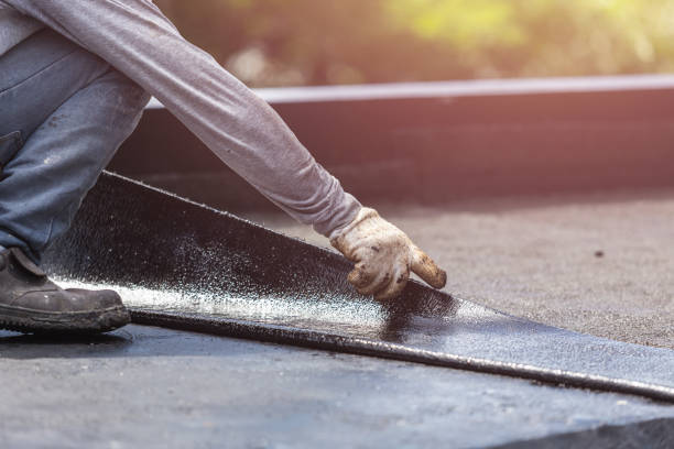 Professional Exterior Waterproofing technician working in Roslyn, NY